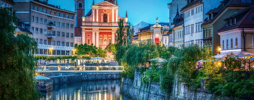 Evening view of the bridge and Ljubljanica river in the city center. Ljubljana, capital of Slovenia.